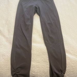 Lululemon grey purple cinch side legging size 4